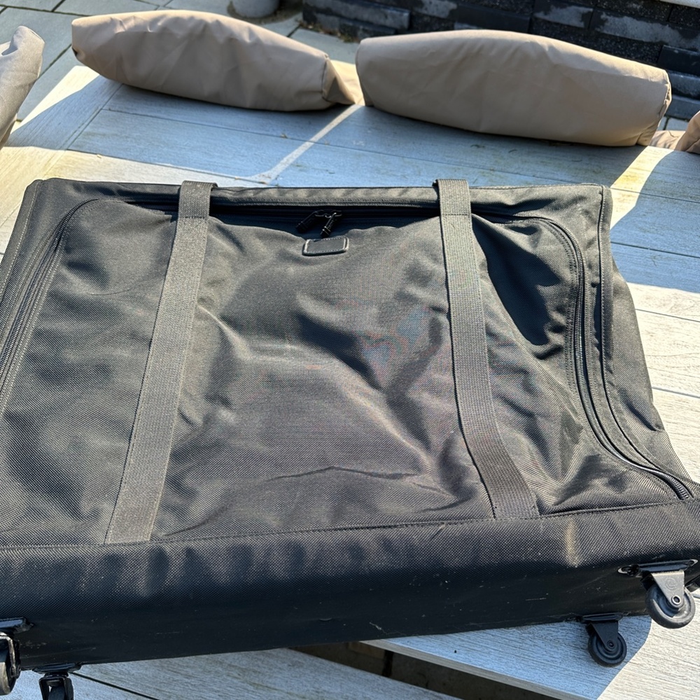 TUMI 30" BLACK BALLISTIC PULLMAN WITH WHEELS